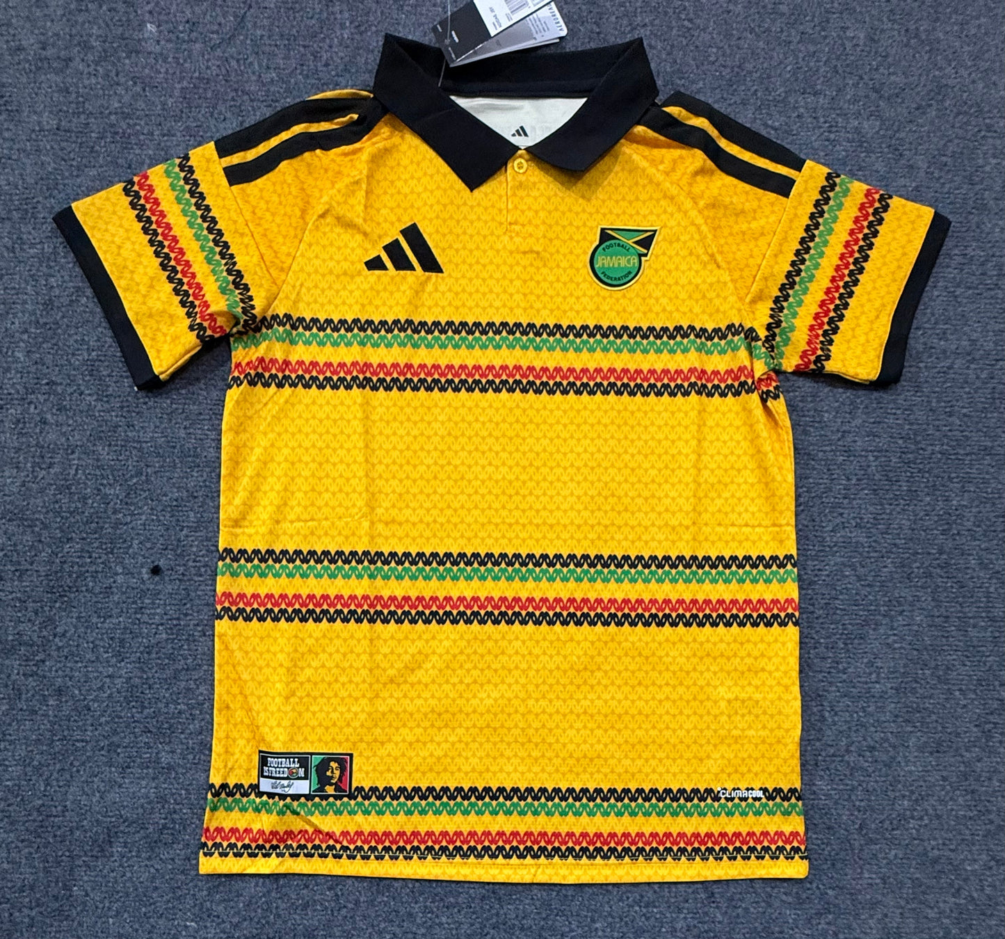 Camisa Jamaica Titular 26/27